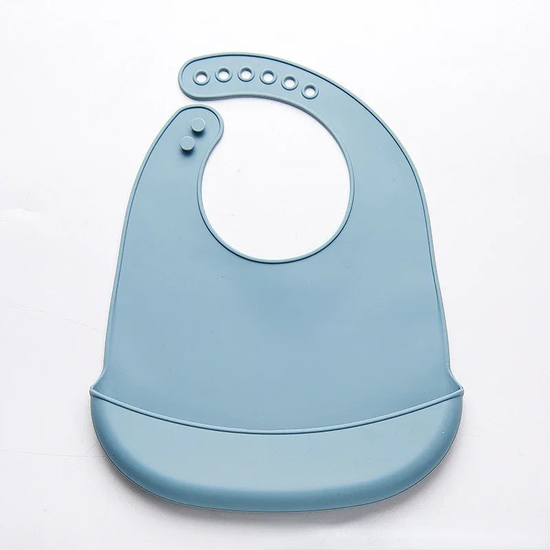 Bavoir bébé en silicone bleu à poche récupératrice